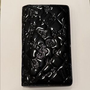 CHANEL Glossy Black Patent Charms Embossed Wallet